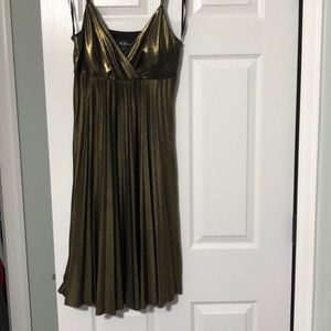 Gold strappy v neck with accordion pleated skirt